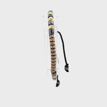 14ct yellow gold pre-owned bracelet with black beads FCA06010741-2