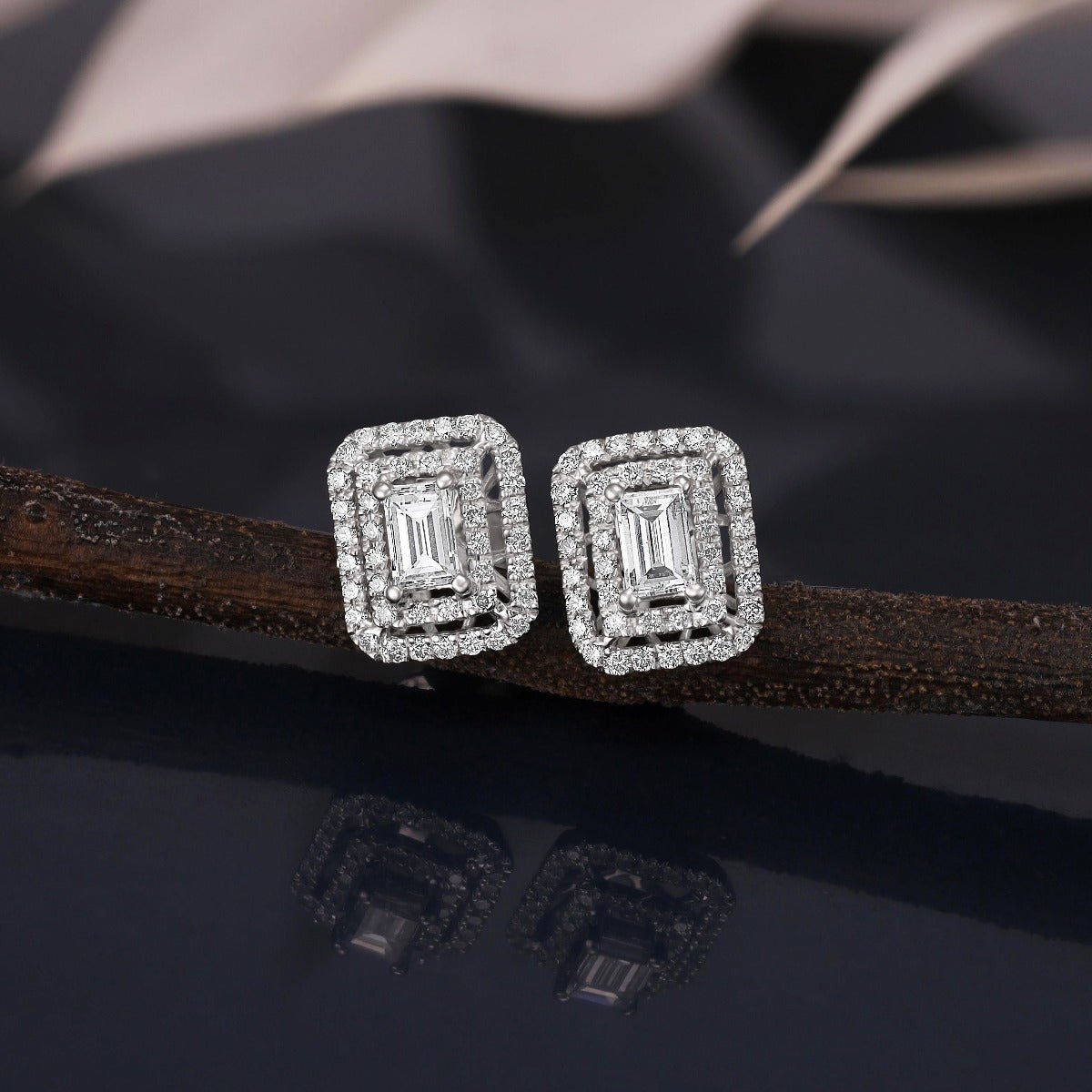 18ct White Gold 0.70ct Emerald Cut Diamond Earrings - FJewellery