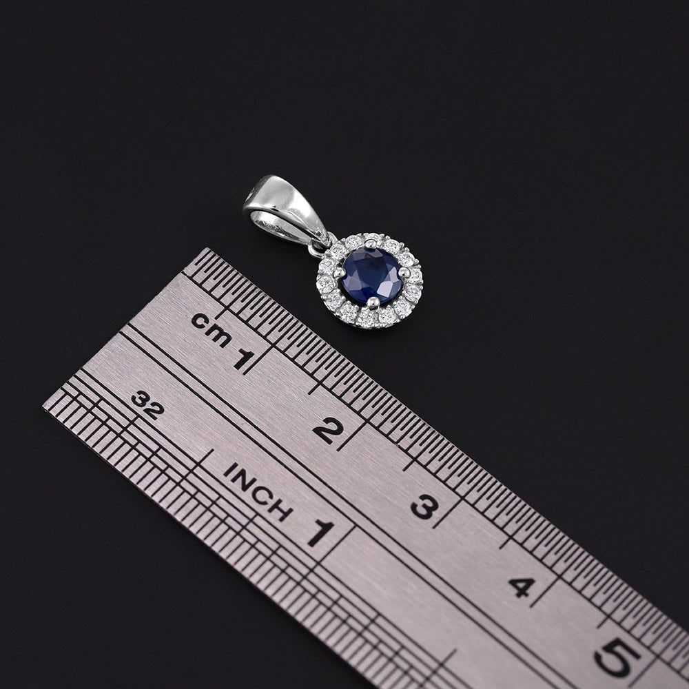 9ct White Gold 0.15ct Diamond and 0.6ct Round Sapphire Pendant - FJewellery